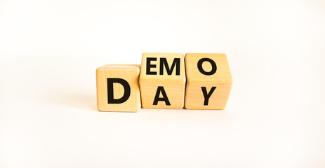 Demo day symbol. Turned wooden cubes with concept words 'demo day' on a beautiful white background....