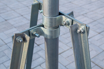 Mounting elements of metal structures on bolts and steel clamps made of galvanized steel.