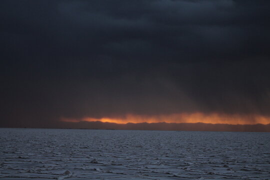 Storm at salt flat desert in northern argentina
