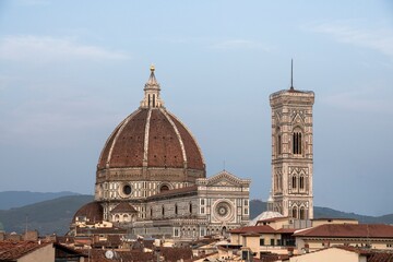 Fototapeta na wymiar View of the Duomo and Giotto's bell tower from the rooftops of Florence