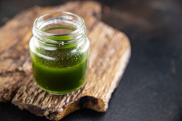 green oil mint, parsley or basil fresh portion ready to eat meal snack on the table copy space food...