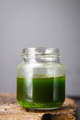 green oil mint, parsley or basil fresh portion ready to eat meal snack on the table copy space food background rustic. top view veggie vegan or vegetarian food