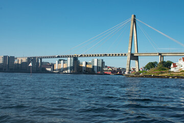 View of downtown Stavanger Norway and bridge from the ocean. Popular cruise destination for accessing famous Trolltunga and Kjerag Hikes