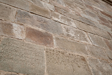 Medieval funerary inscriptions carved directly into the walls of the Monastery of San Juan de la Peña, in the Spanish Pyrenees