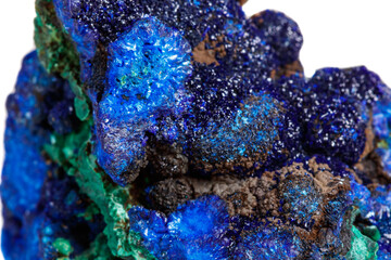 Macro mineral stone malachite with azurite on white background
