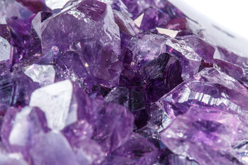 Fototapeta premium Amethyst Crystal Druse macro mineral on white background