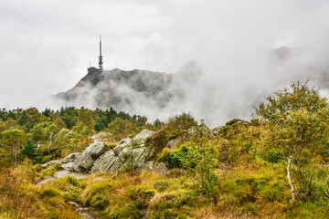 Urliken mountain peak in the clouds, Norway