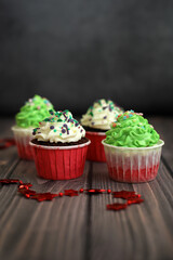 New Year celebration cupcakes on a dark background. Concept food, baking, holidays.
