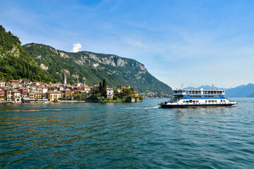 the beautiful town of Varenna, a ferry in Lake Como, Italy 