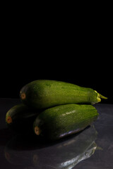 zucchini zucchini on black and white background. Minimalistic concept