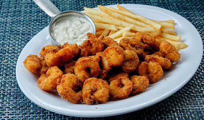 fried shrimp plate with fries
