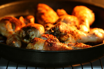 Chicken meat in the oven to cook