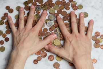Man hands counting coins at home
