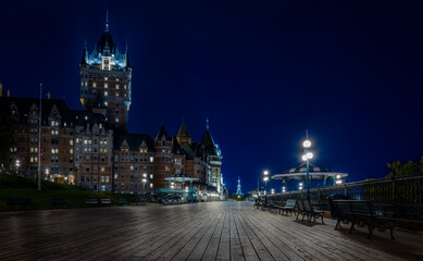 night view of Quebec City's Chateau Frontenac and its boardwalk.
