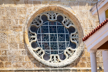 Closeup view of the San Pedro Claver sanctuary rose window in Cartagena de Indias, Colombia