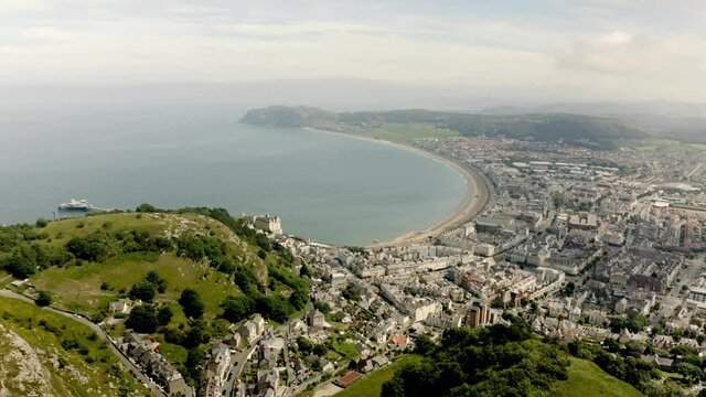 Aerial view of Llandudno in the distance from the top of great orme summit cable car station