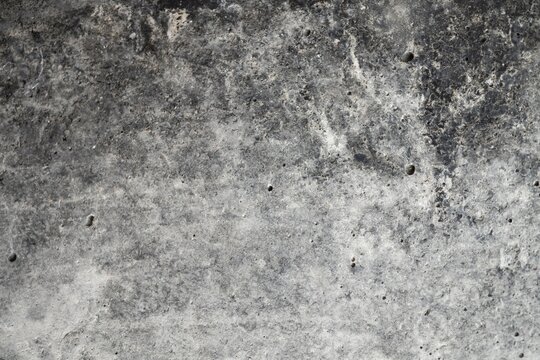 Black cement wall texture rough background. An old dark grundge concrete floor background.