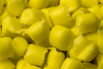 Yellow granules of polypropylene or polyamide. Macro photography. Plastics and polymers industry....