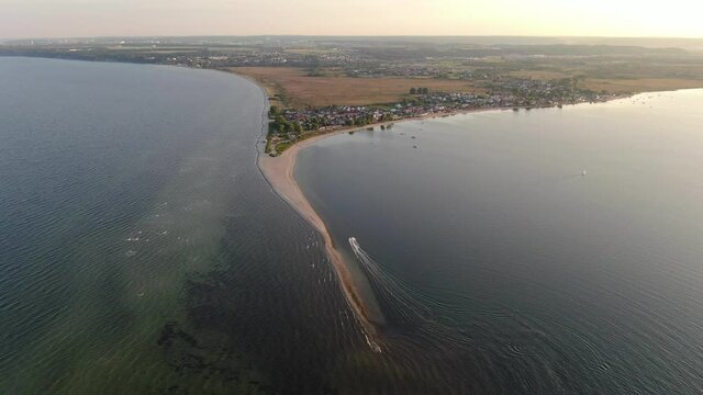Flying over the sandbar in Rewa village at the Baltic Sea in Poland, Europe
