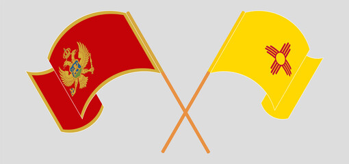 Crossed and waving flags of Montenegro and the State of New Mexico