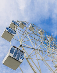 ferris wheel over the blue sky
