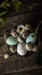 easter chicken and quail eggs in a plate on a wooden table