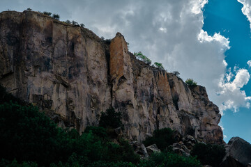 Huge stones and behind trees in ihlara valley