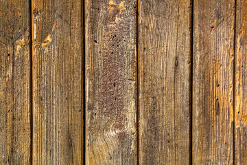 Old weathered wooden planks or boards as rustic background