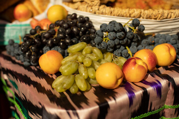 Fruit on the table. Grapes of different kinds.