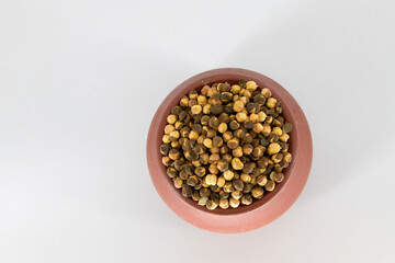 Selective focused Indian health snack roasted chickpeas with salt on an isolated white background. Cooked without oil and very healthy daily snacks, Tamilnadu, Mumbai, Delhi, Kerala.