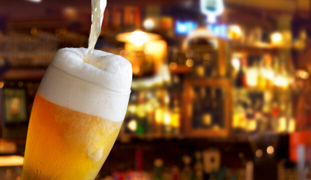 beer pouring into glass