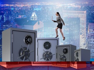 Businesswoman walking on top of safe