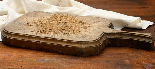empty rectangular wooden cutting kitchen board on table, top view