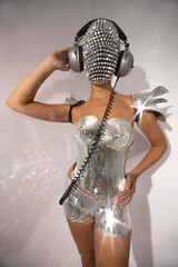 Mrs disco woman with sparkly face and headphones - obrazy, fototapety, plakaty