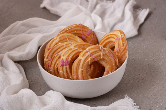 Spanish dessert churos in a white plate