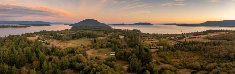 Panoramic Aerial Sunset View of Lummi Island, Washington. Looking south in the Salish Sea with...