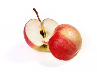 Two halves of ripe red-yellow apple, isolated on white