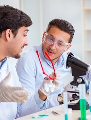 Team of chemists working in the lab