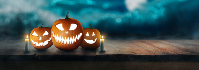 Pumpkin Jack O 'Lantern with spooky glowing eyes on Halloween night