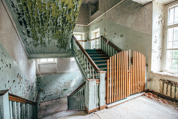 Hanging noose of rope in creepy abandoned building