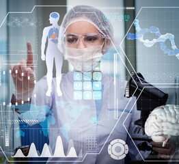 Doctor in futuristic medical concept pressing button