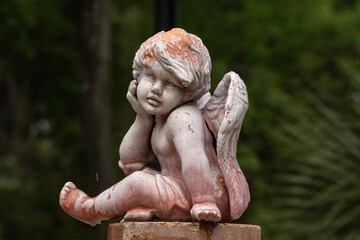 statue of an angel in a cemetery