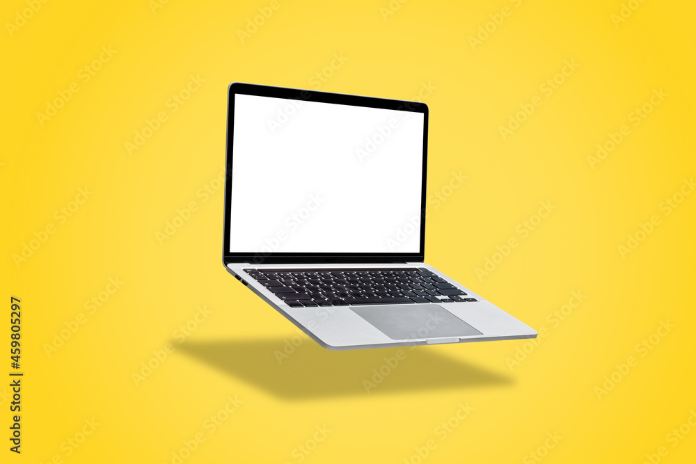 Canvas Prints laptop computer with blank screen, floating on a yellow background.