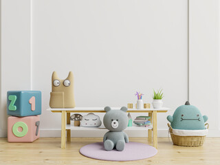 Mockup of wall in a children's room with doll on light white backdrop.
