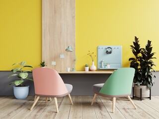 In an office room with a pastel background, there is a yellow wall.