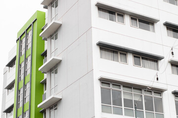 Multi-storey building in gray and green