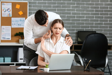 Boss harassing his secretary in office