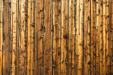 Old weathered brown wood siding background