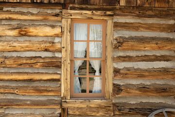 Old wood window in log cabin