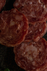 star anise meat table sausage almonds and grapes cheese